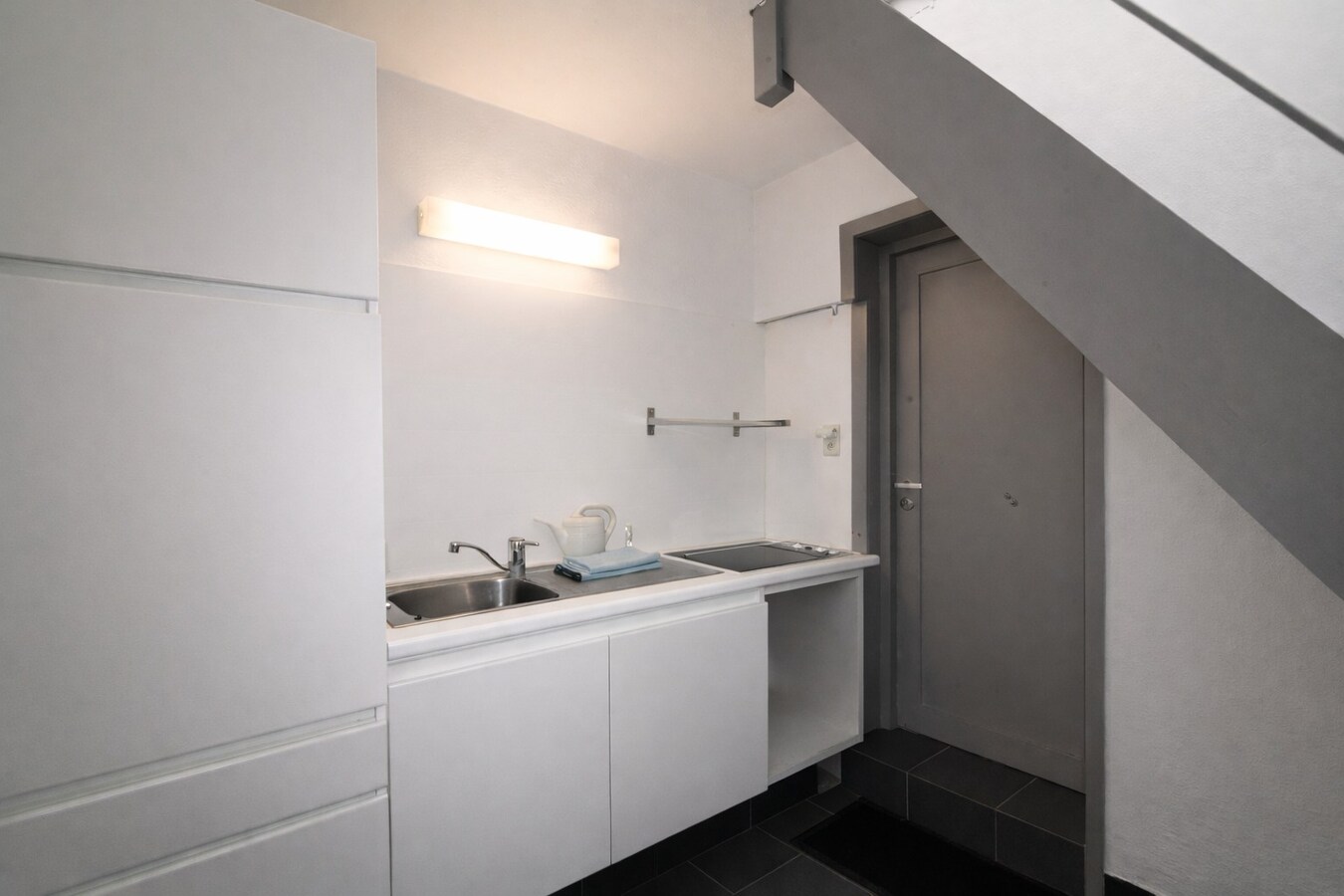 Te koop in Sint-Niklaas: uitzonderlijk handelshuis met woonst en duplex appartement, met optionele garageboxen en sterk opbrengstpotentieel 