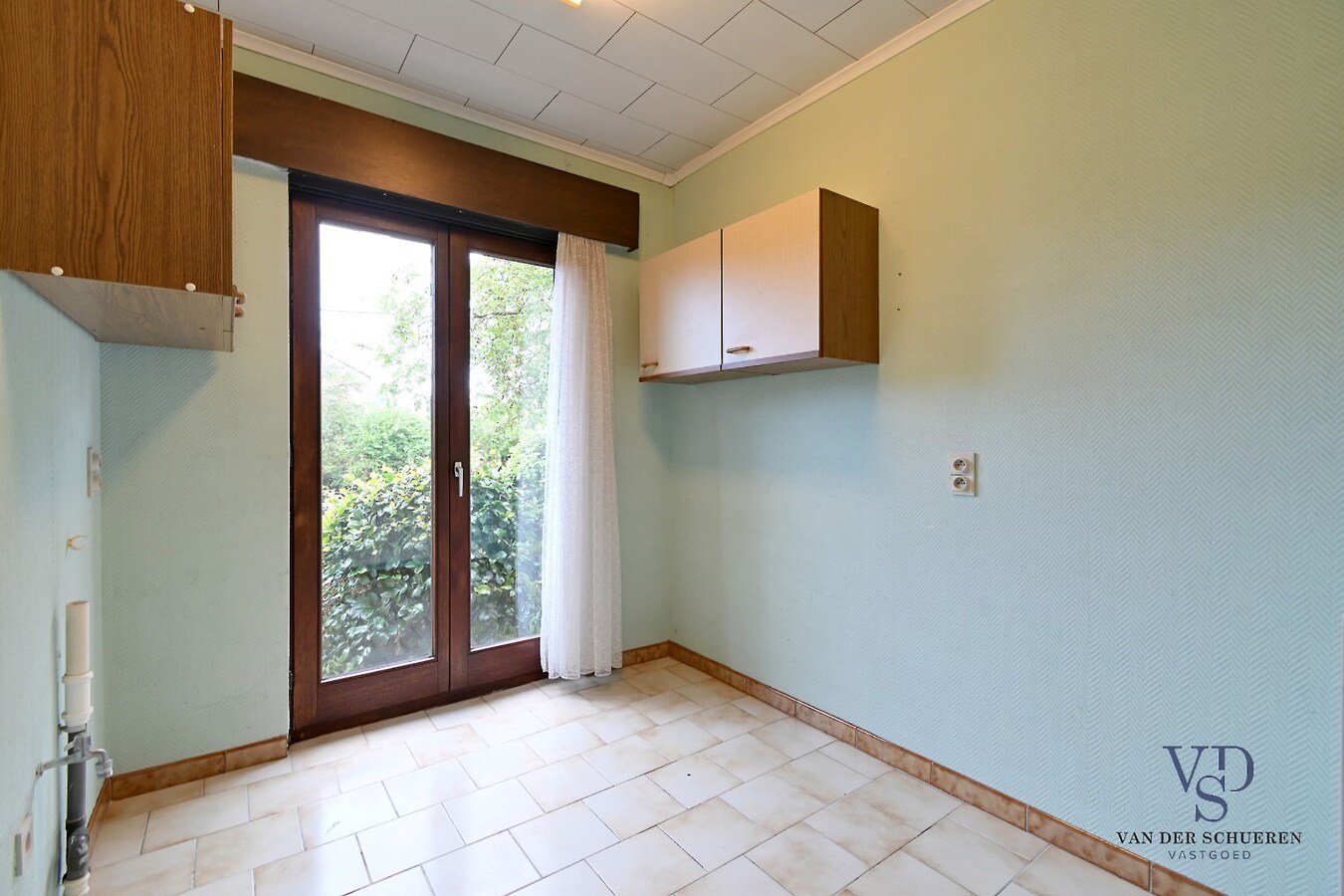 Tijdloos wonen in 't groene Schelderode. 