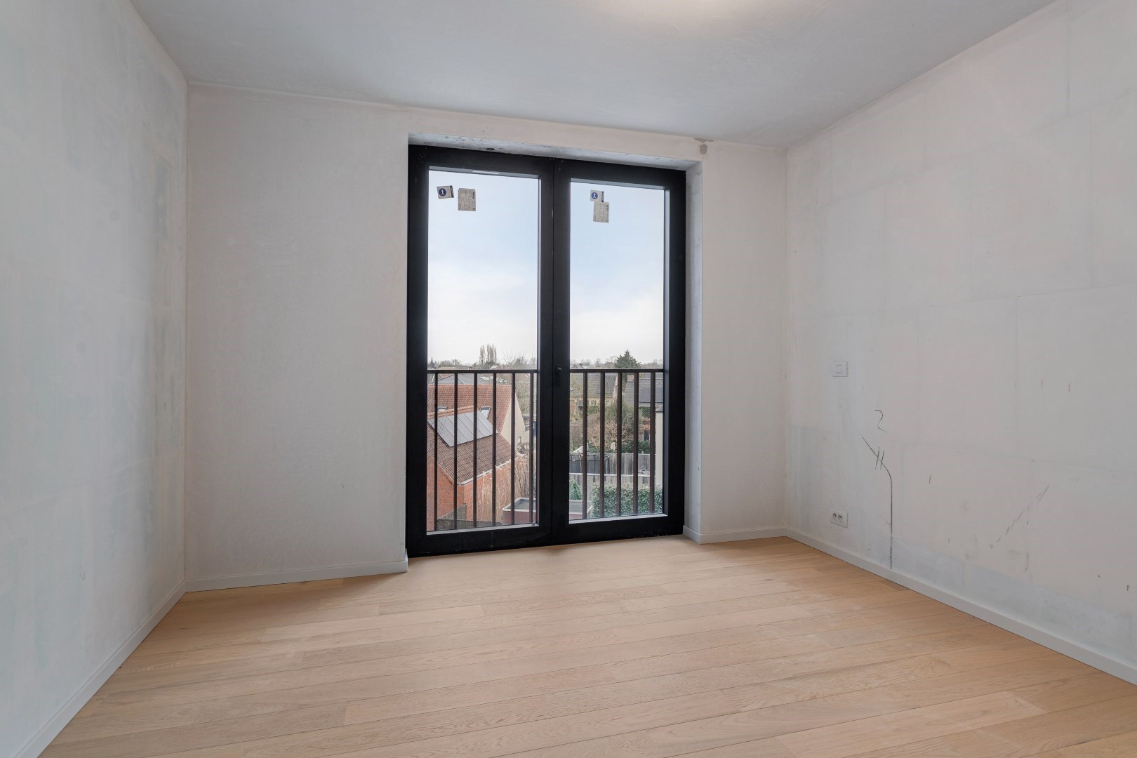 Nieuwbouwappartement met twee slaapkamers, terras en ondergrondse autostaanplaats te koop in Zulte 