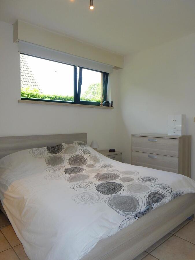 Gezellig gelijkvloersappartement met zonnige tuin en garage 