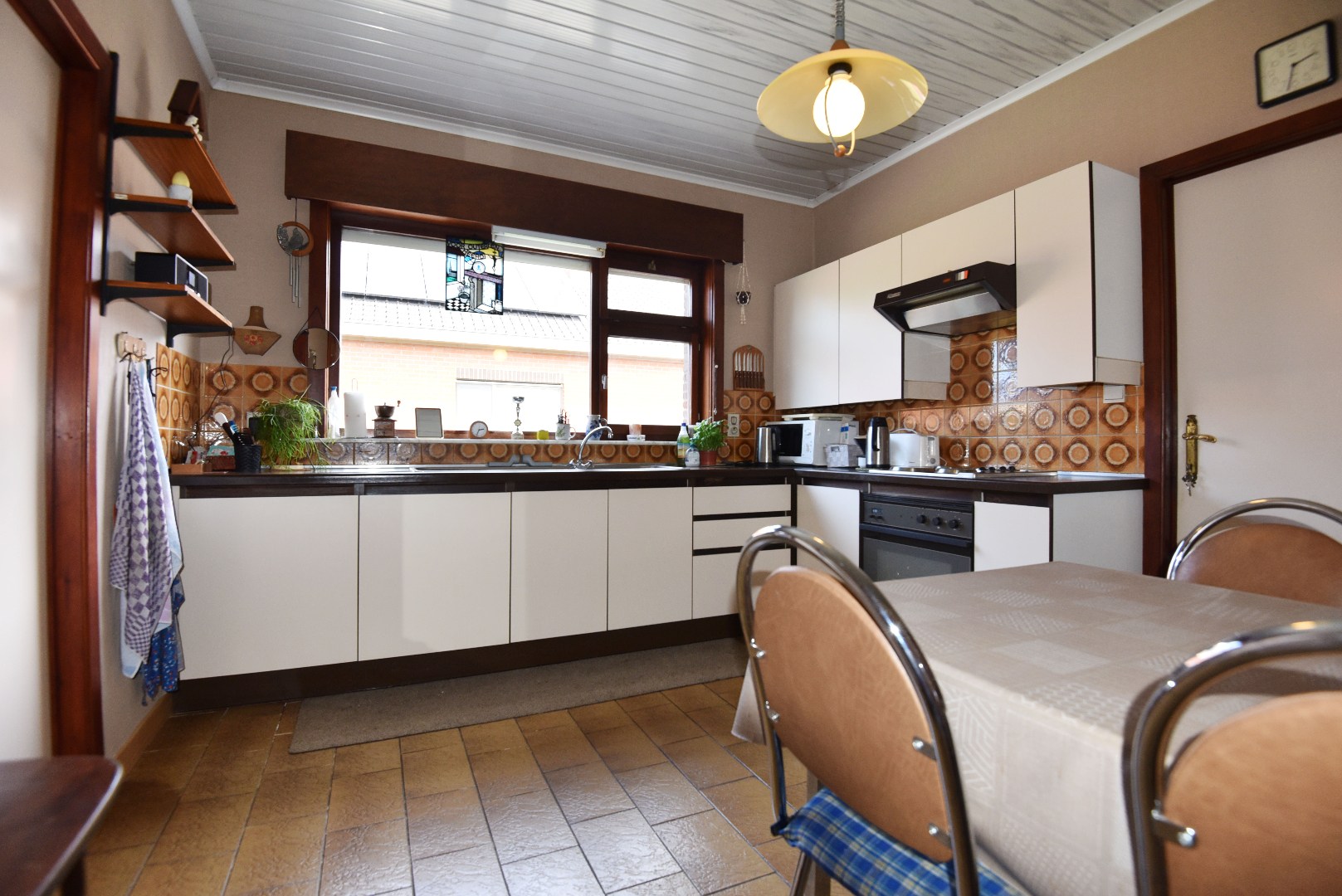 Op te frissen woning met 3 slpks in de Bloemenwijk in Maldegem 