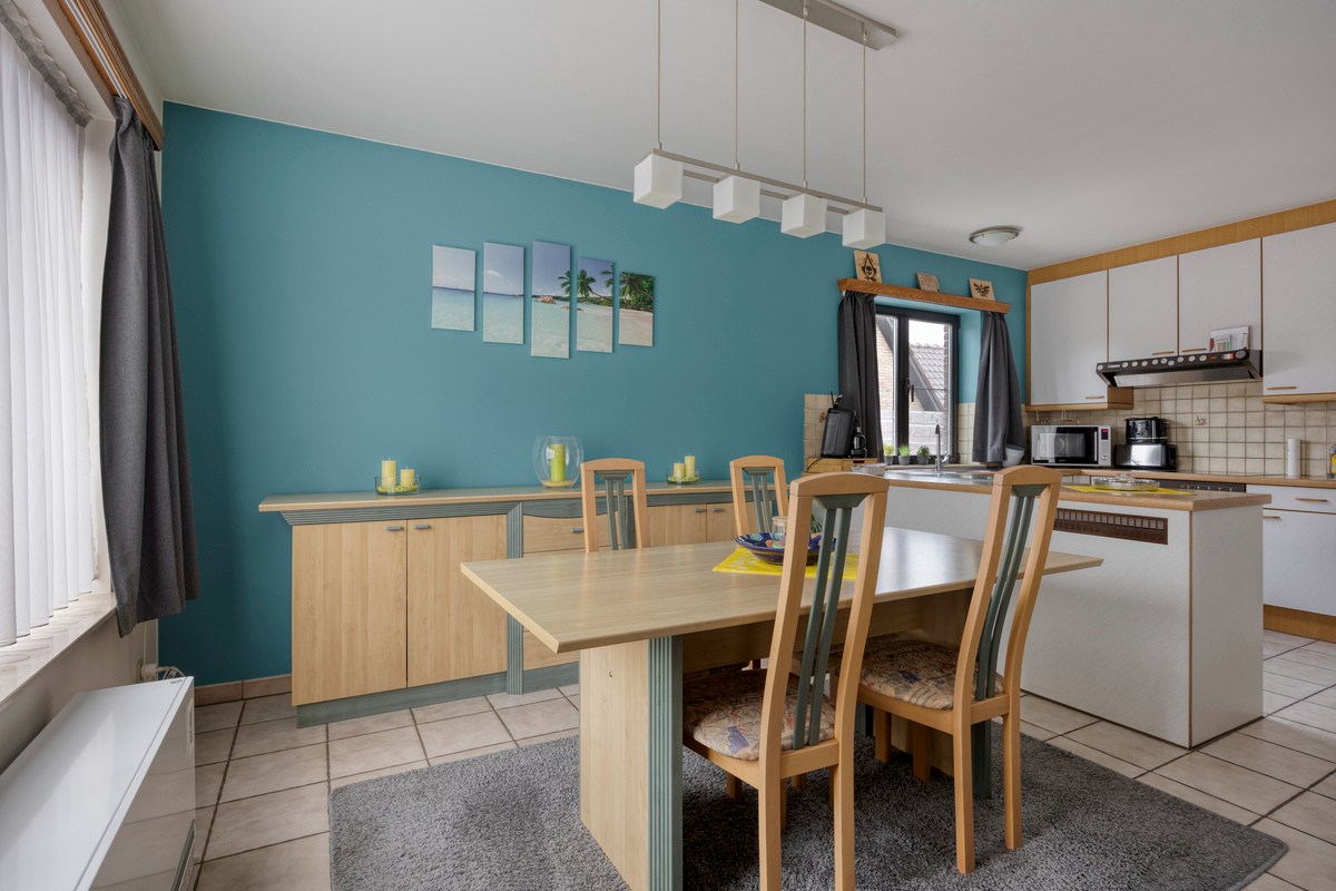 Opbrengsteigendom met 3 appartementen en 7 garages 