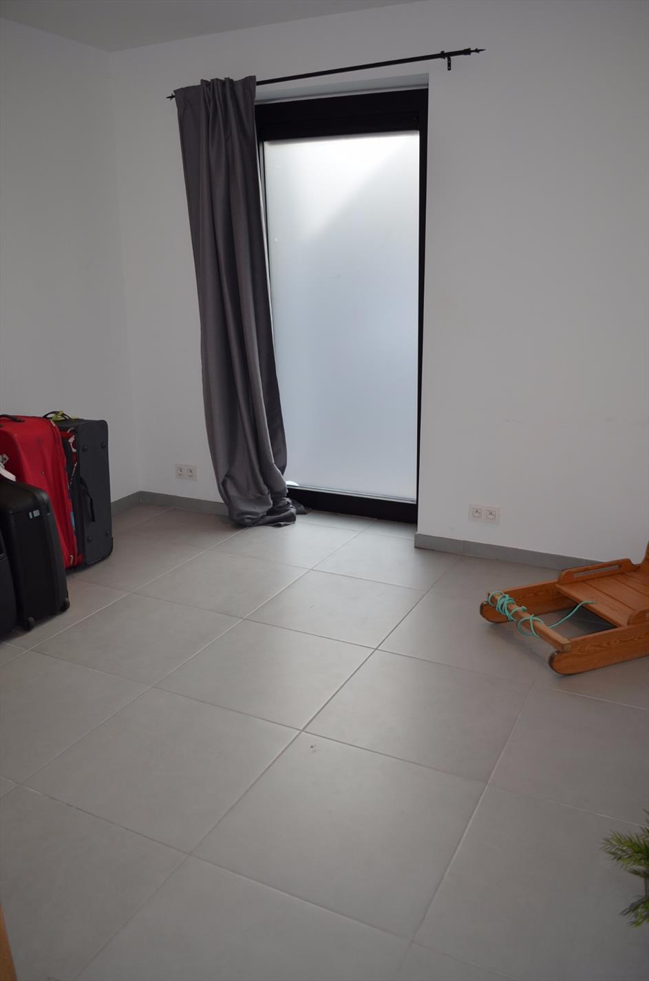 Nieuwbouw woning met 2 slpks, carport en tuin te centrum Maldegem 