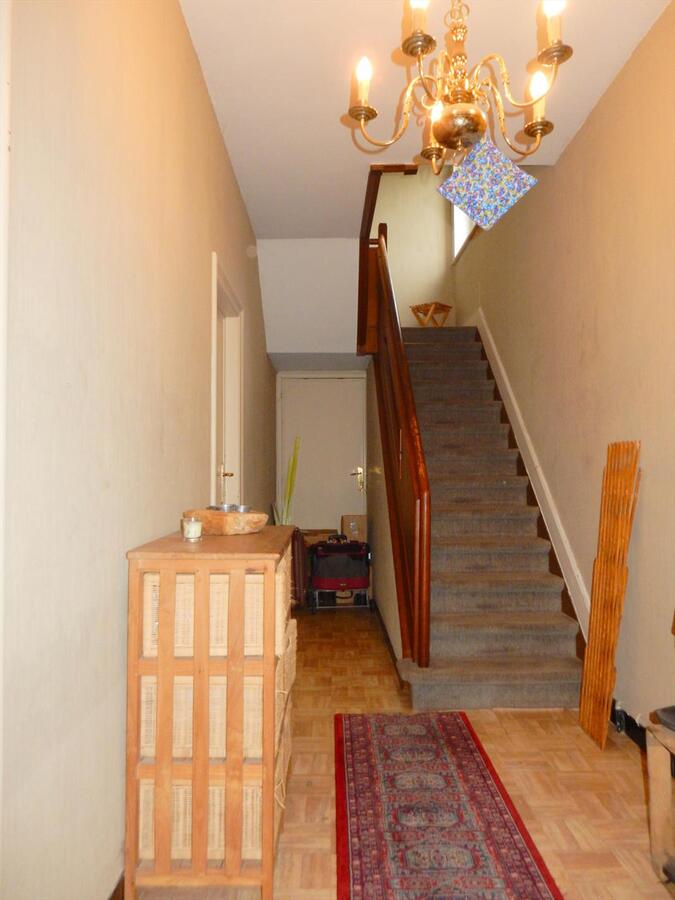 Woning met zonnige tuin en garage 