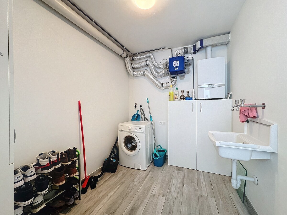 Recent (2017) gelijkvloers appartement met grote tuin te Ophasselt 