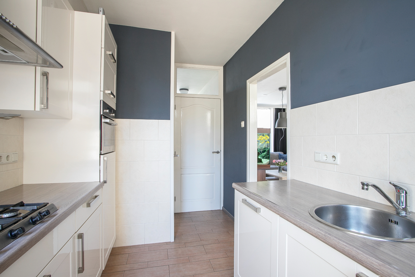 Instapklare eindwoning met 3 slaapkamers en grote zolderverdieping, berging en zonnige achtertuin. 