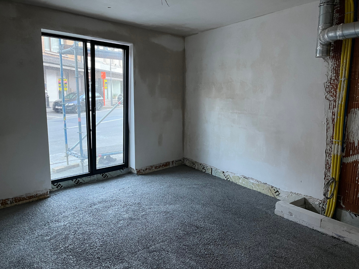 Ruim, gelijkvloers BEN-nieuwbouwappartement te Gavere. 