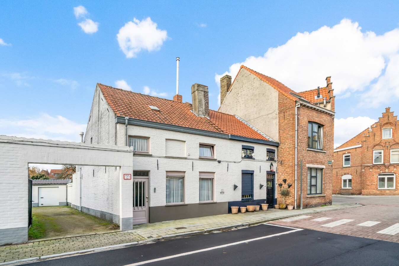 Halfopen bebouwing met terras in Christus - Koning (Stubbekwartier) 