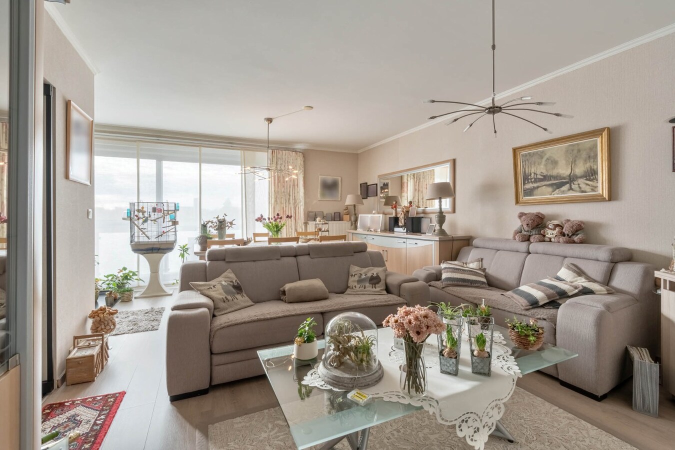 Comfortabel investeringsappartement met 2 slaapkamers en garage, in dorpskern 