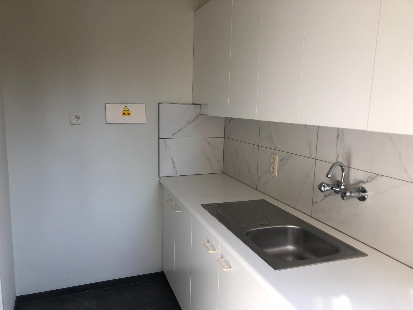 Centraal gelegen 1-slaapkamerappartement met garage 