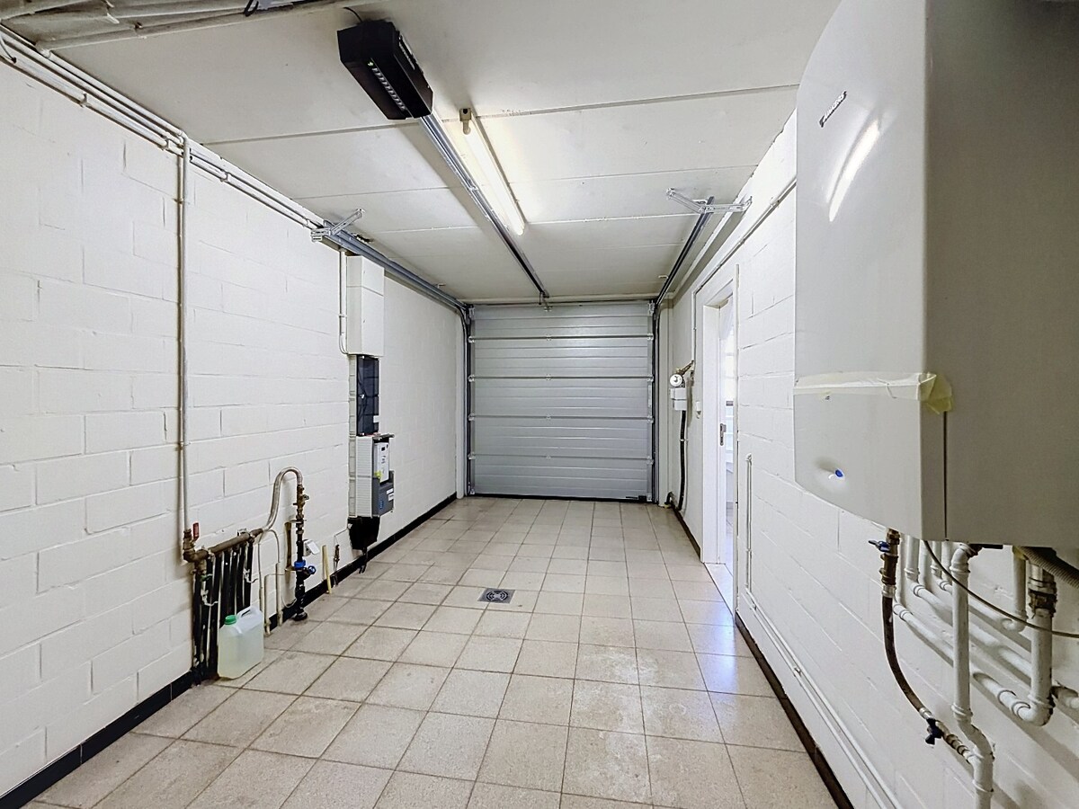 GERENOVEERDE RIJWONING MET 4 SLAAPKAMERS IN CENTRUM ZOMERGEM 