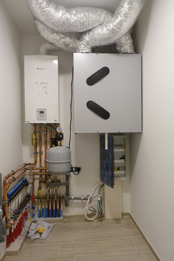 Kwalitatief nieuwbouwappartement met enorm terras en garagebox 