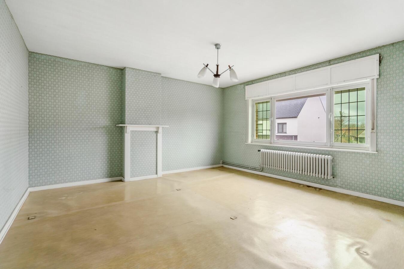 Rustige gelegen open bebouwing met bouwgrond op 1780 m² te Koekelare 