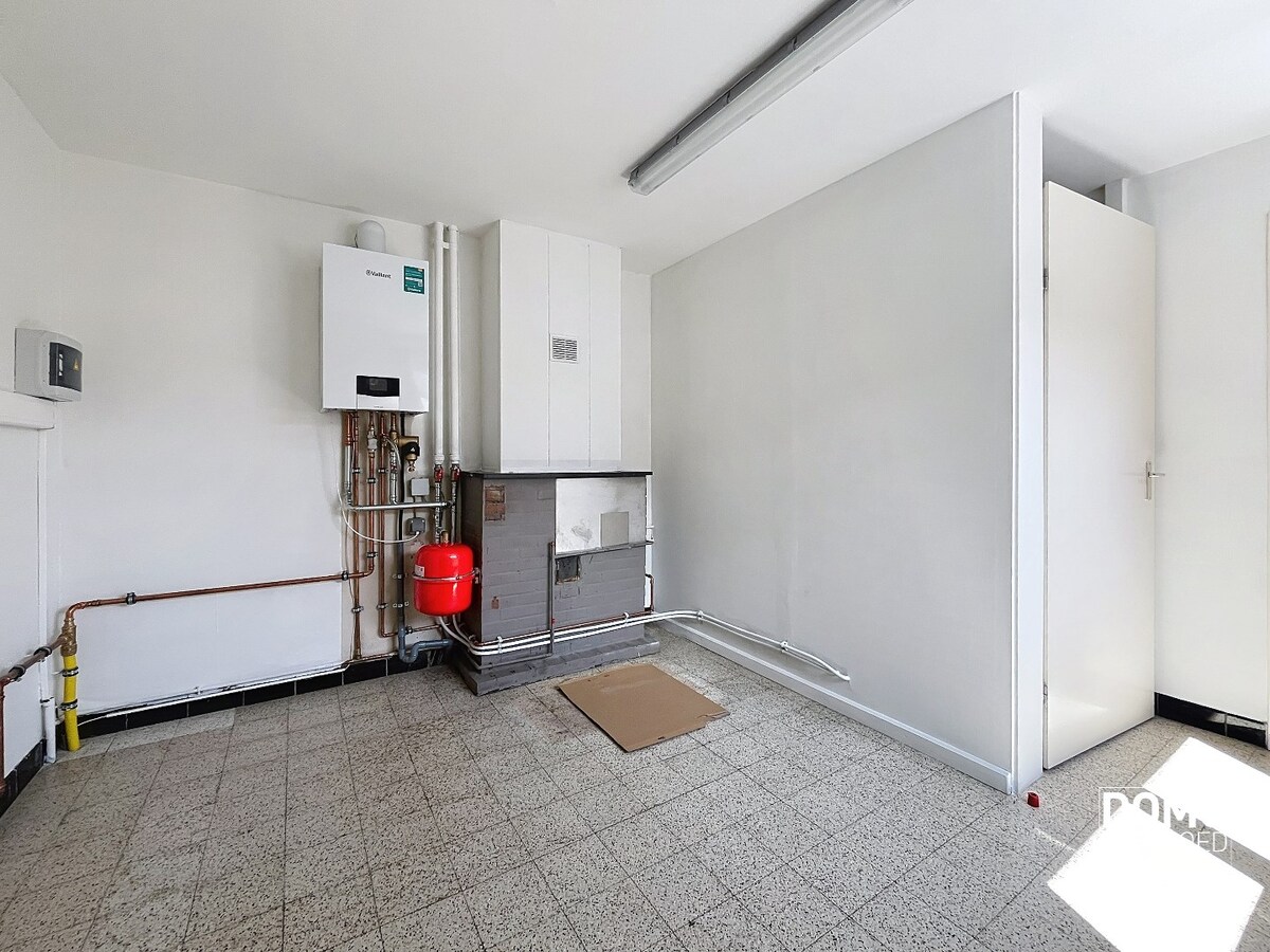 RUIME WONING MET TUIN, GARAGE &amp; 3 SLAAPKAMERS RUSTIG GELEGEN LANGS HET KANAAL MET EPC C TE BERINGEN 