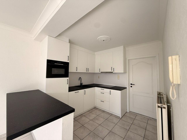 Prachtig appartement met 2 slaapkamers, terras en garage in het centrum van Dilsen 
