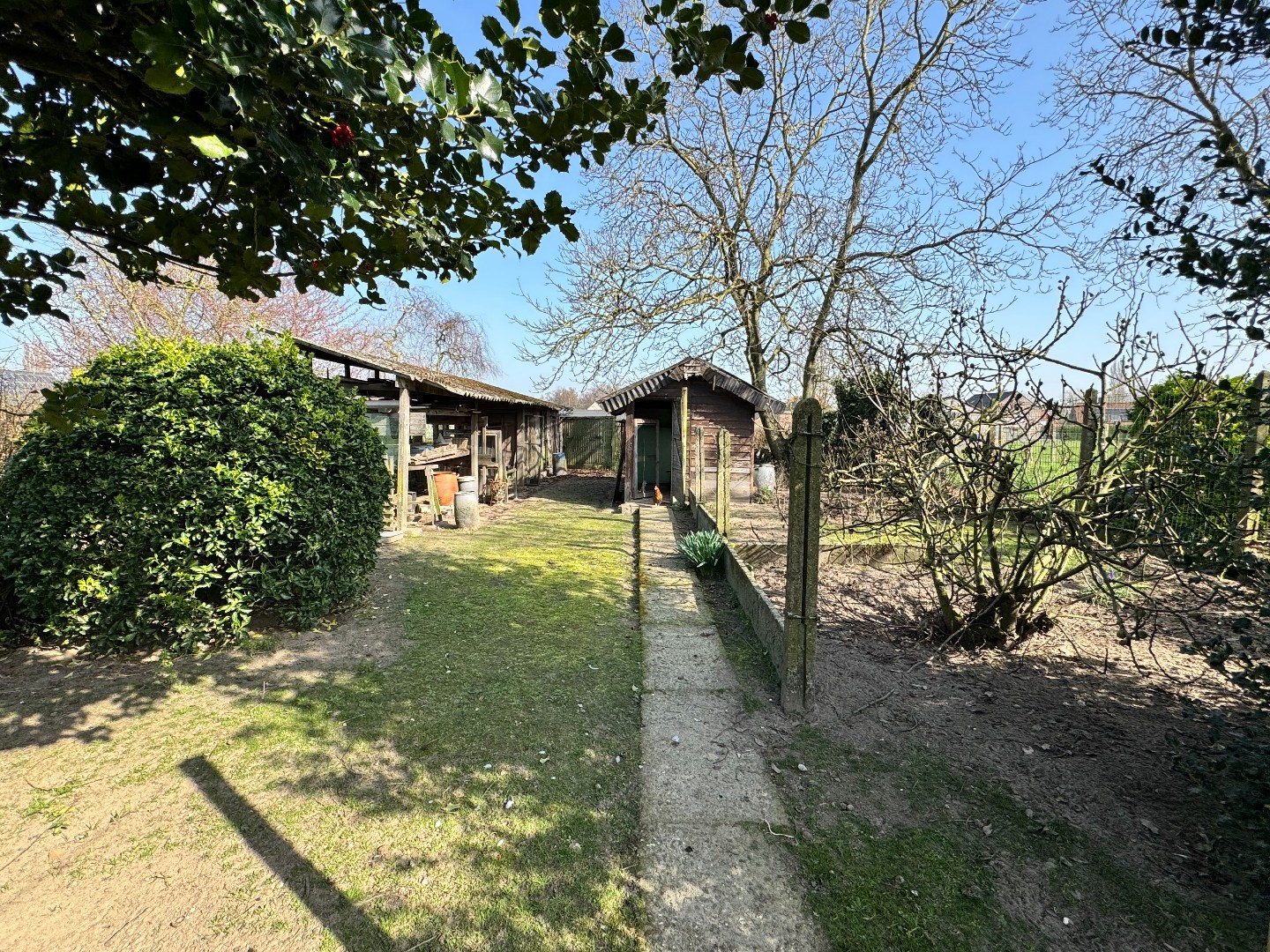 Woning met veel potentieel, 4 slaapkamers en garage te Zulte. 