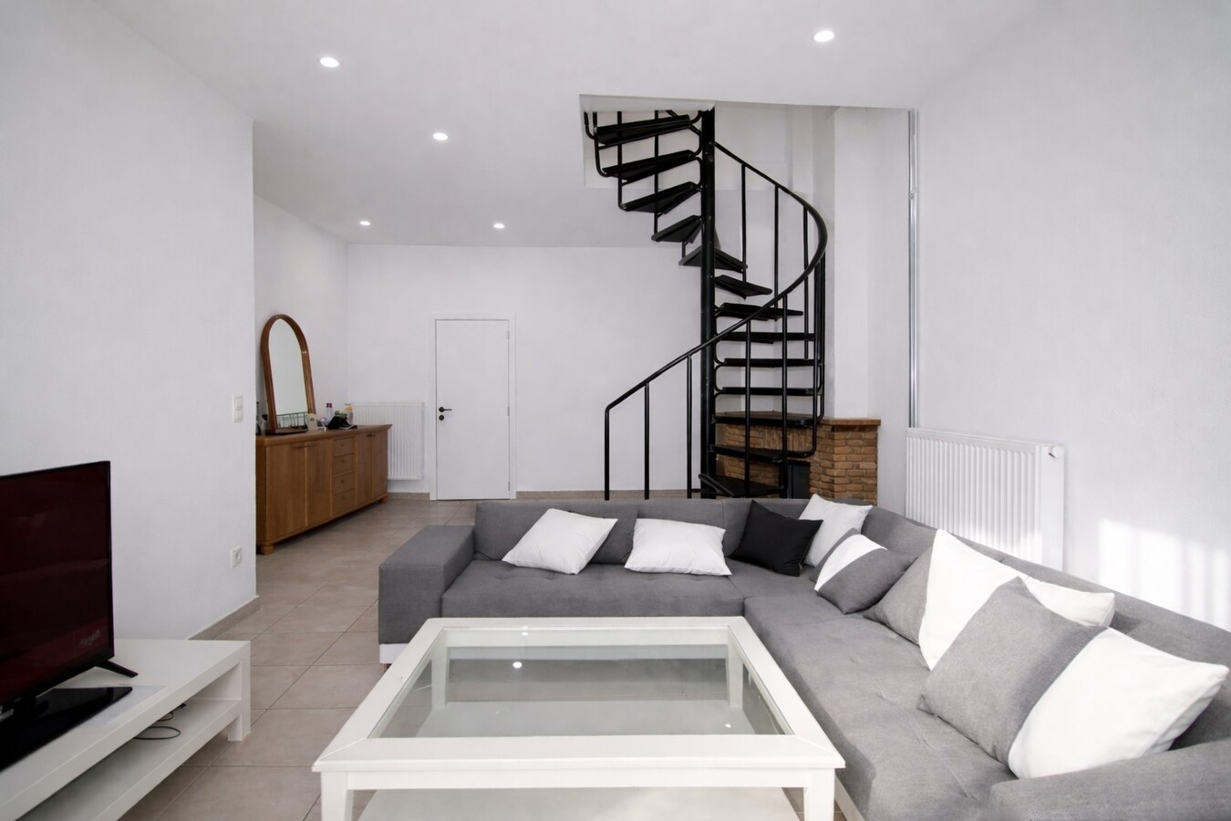 Te koop: Centraal gelegen woning met twee slaapkamers, zolderverdieping, EPC label C én tuin in Sint-Niklaas! 