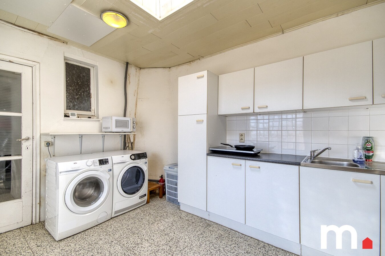 Kloeke half open bebouwing in Desselgem met tuin, terras en garage . 