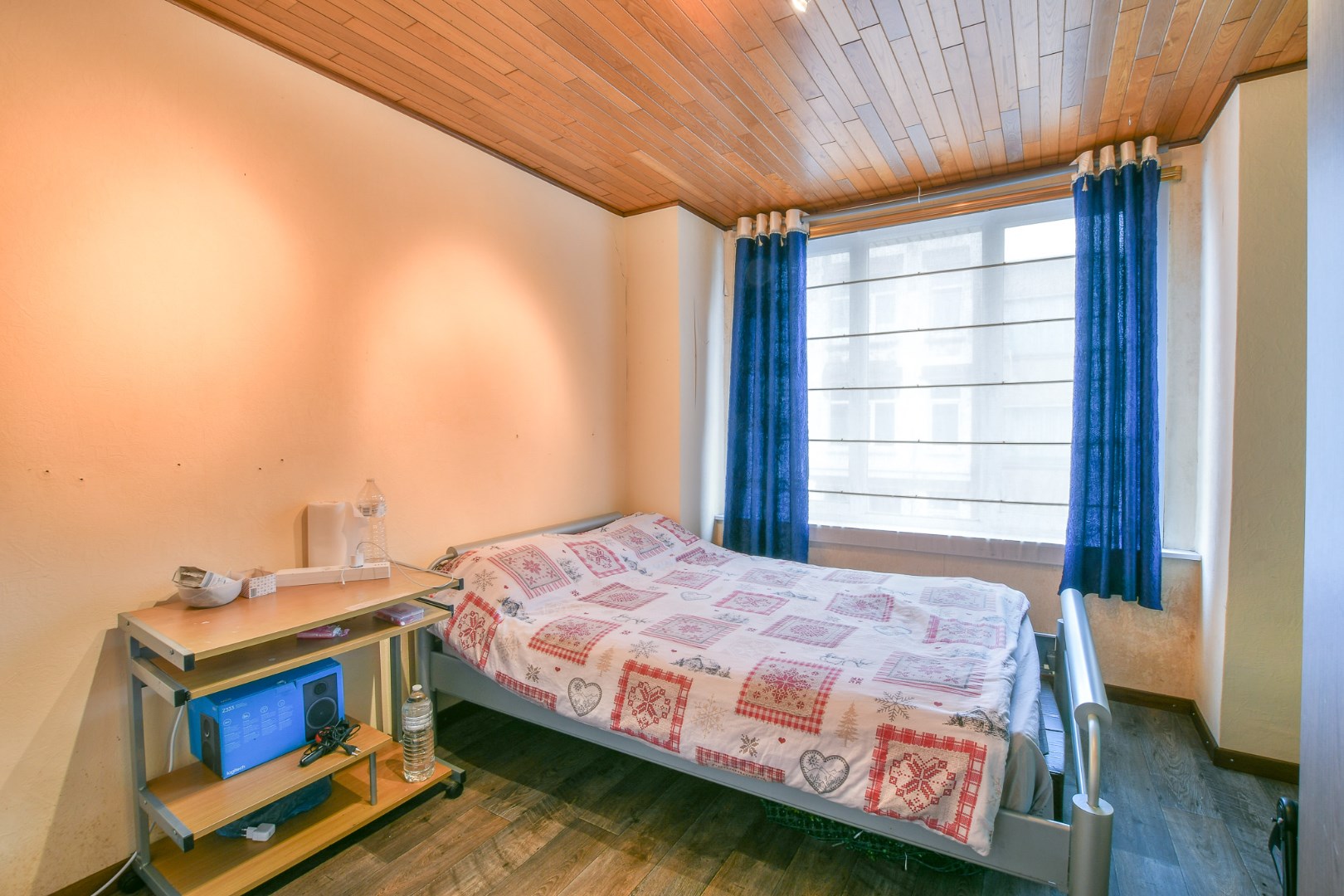 Centraal gelegen rijwoning met 4 slaapkamers en koer 