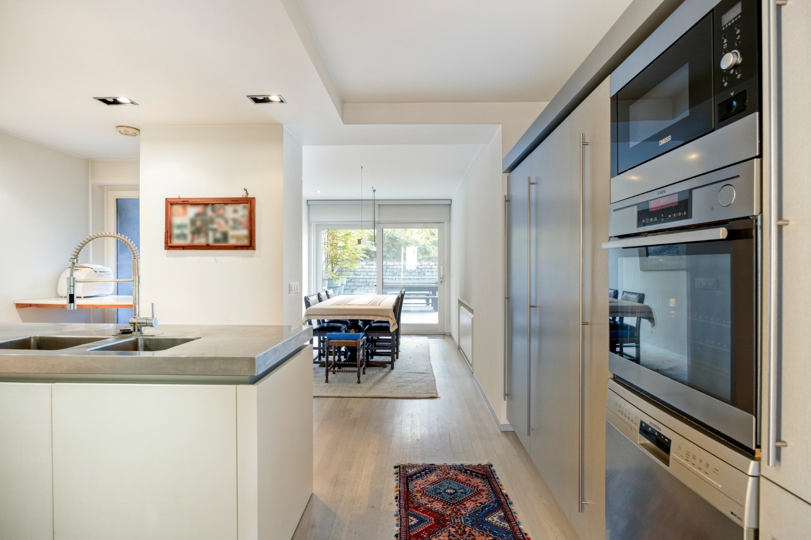 Gelijkvloers appartement met een terras van 50m²,  3 slaapkamers en staanplaats in het centrum van Leuven! - bewoonbare opp. 147m² 