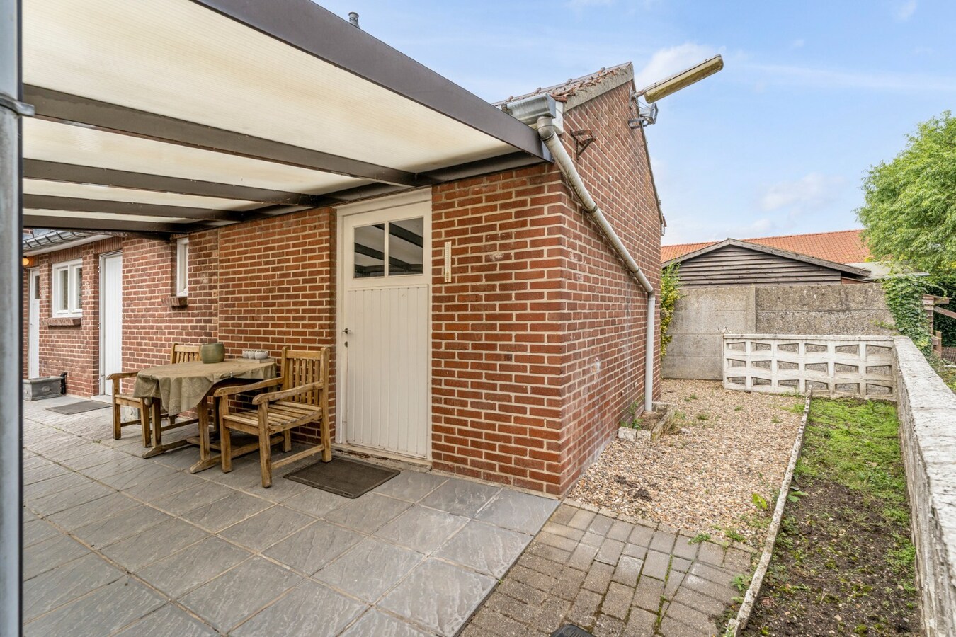 Halfvrijstaande gezinswoning op een ruim perceel van 13a80ca op wandelafstand van het centrum van Opoeteren! 