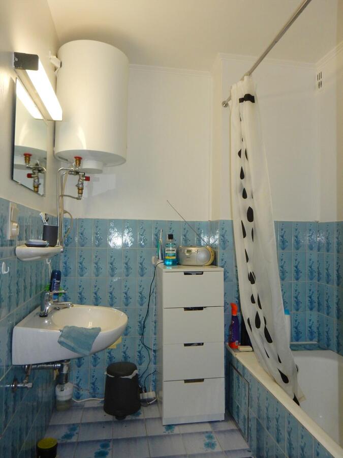 Appartement met garage en grote tuin 