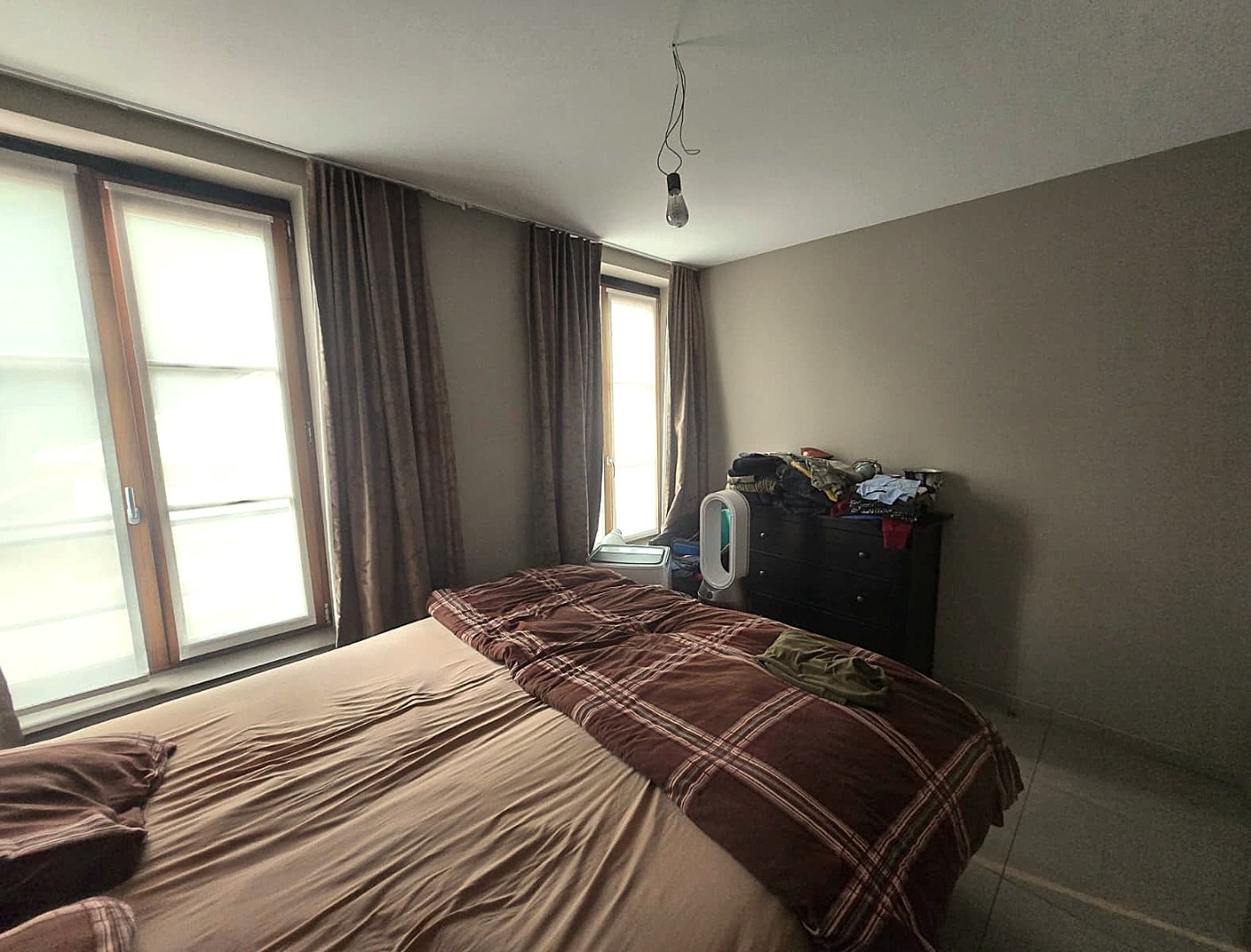 Ruim hoek appartement op de eerste verdieping in het dorp van Bachte-Maria-Leerne. 