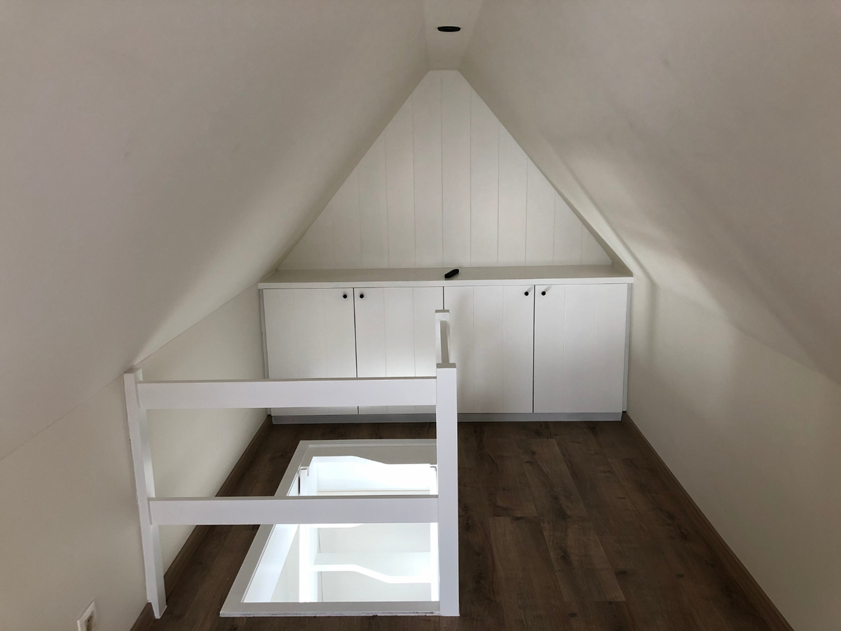 Tijdloos dakappartement met bijzonder ruim terras in centrum Gavere 