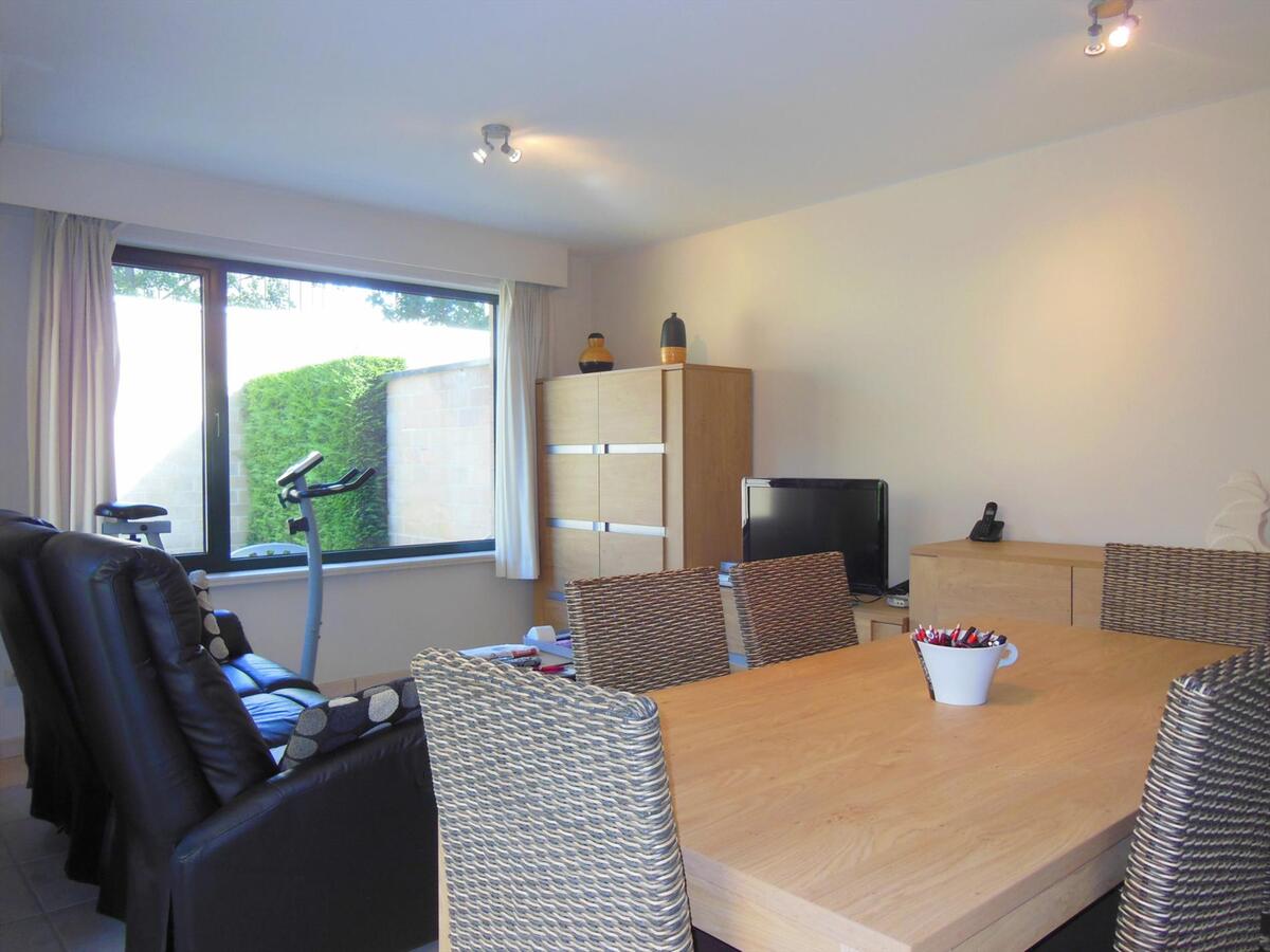 Gezellig gelijkvloersappartement met zonnige tuin en garage 