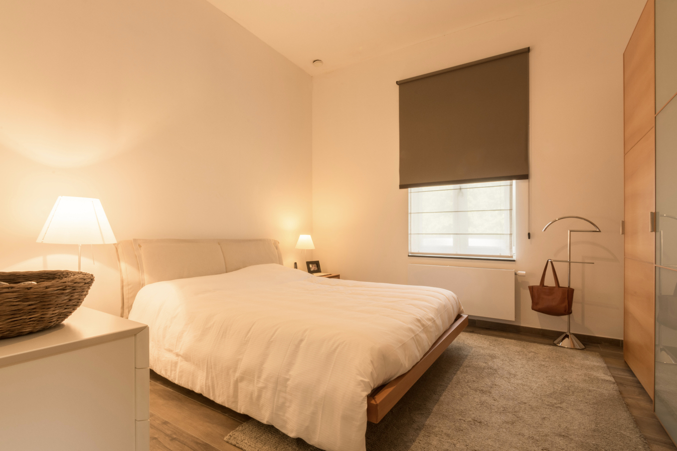 Gelijkvloers luxe 2-slk-appartement met privatieve tuin. 