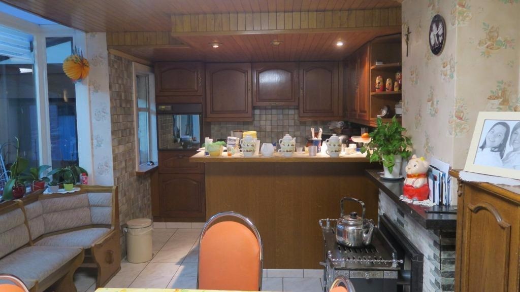 Uiterst ruime, halfopen woning met 4 slaapkamers 