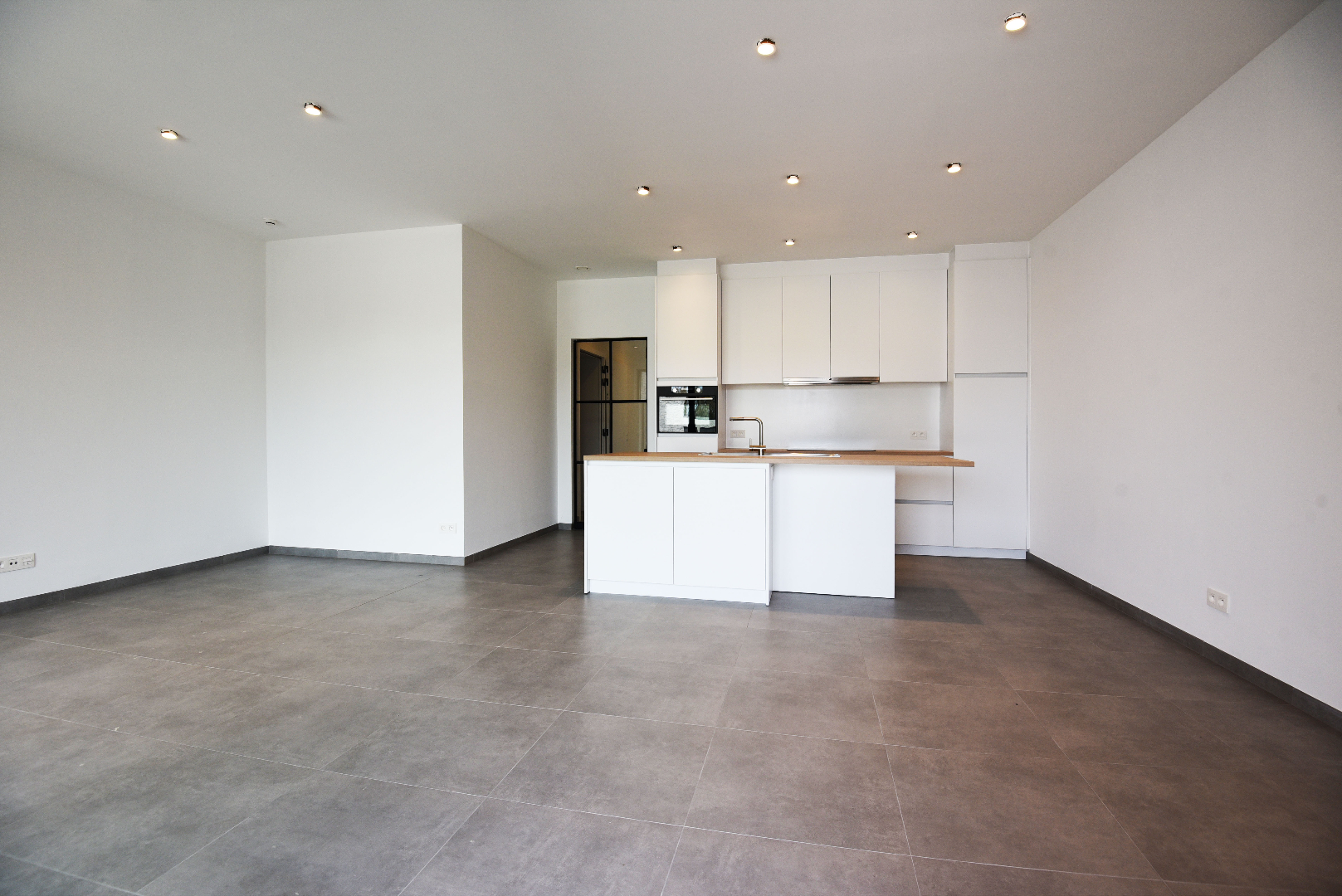 Nieuwbouw appartement met 1 slaapkamer, terras en tuin te Lembeke-Dorp 