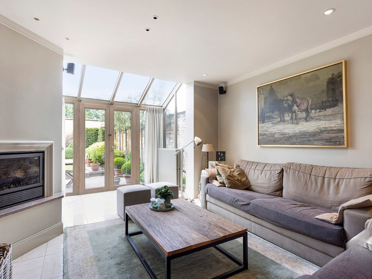 Charmant handelspand met woonst op de markt in Kruishoutem 