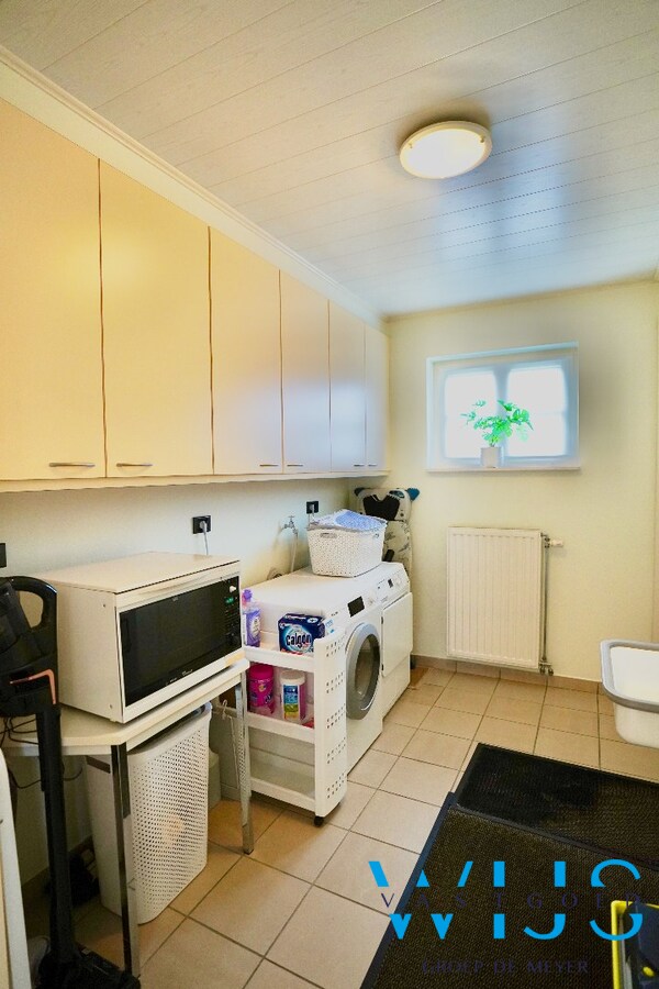 Instapklare open bebouwing met prachtige tuin op 1.220 m² in rustige woonwijk 