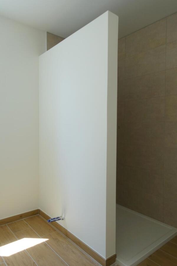 Half-open nieuwbouwwoning met zonnige tuin 