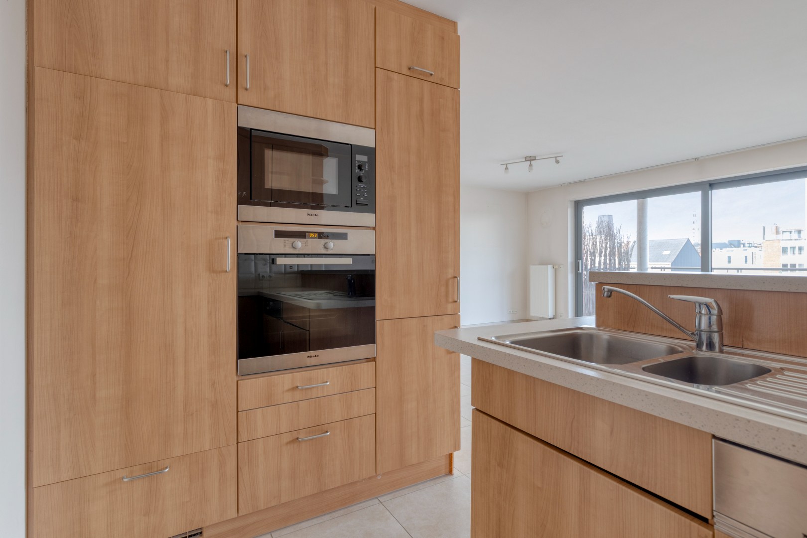 Appartement met 2 slaapkamers, ruim terras en garagebox in Leuven! – EPC 92 kWh/m² – bewoonbare opp. 94m² 