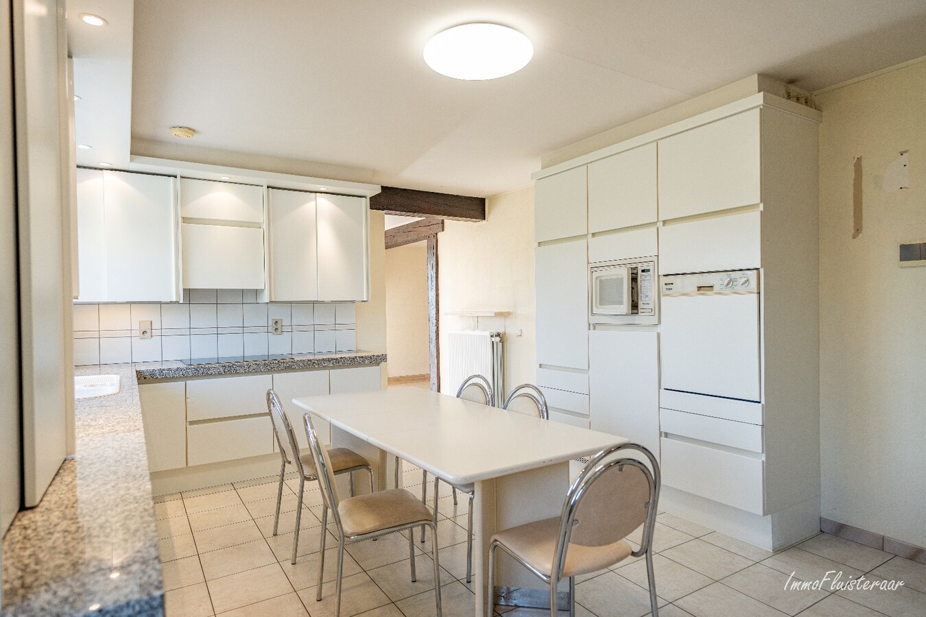 Woning met paardenstallen en buitenpiste op ca. 6,5ha te Bree 