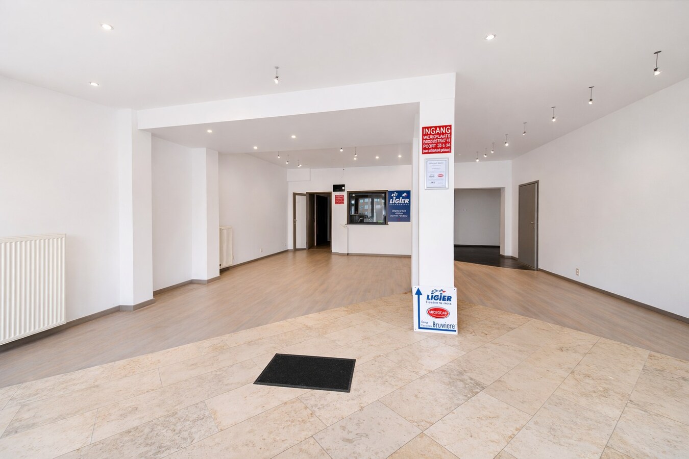 Te koop in Sint-Niklaas: uitzonderlijk handelshuis met woonst en duplex appartement, met optionele garageboxen en sterk opbrengstpotentieel 