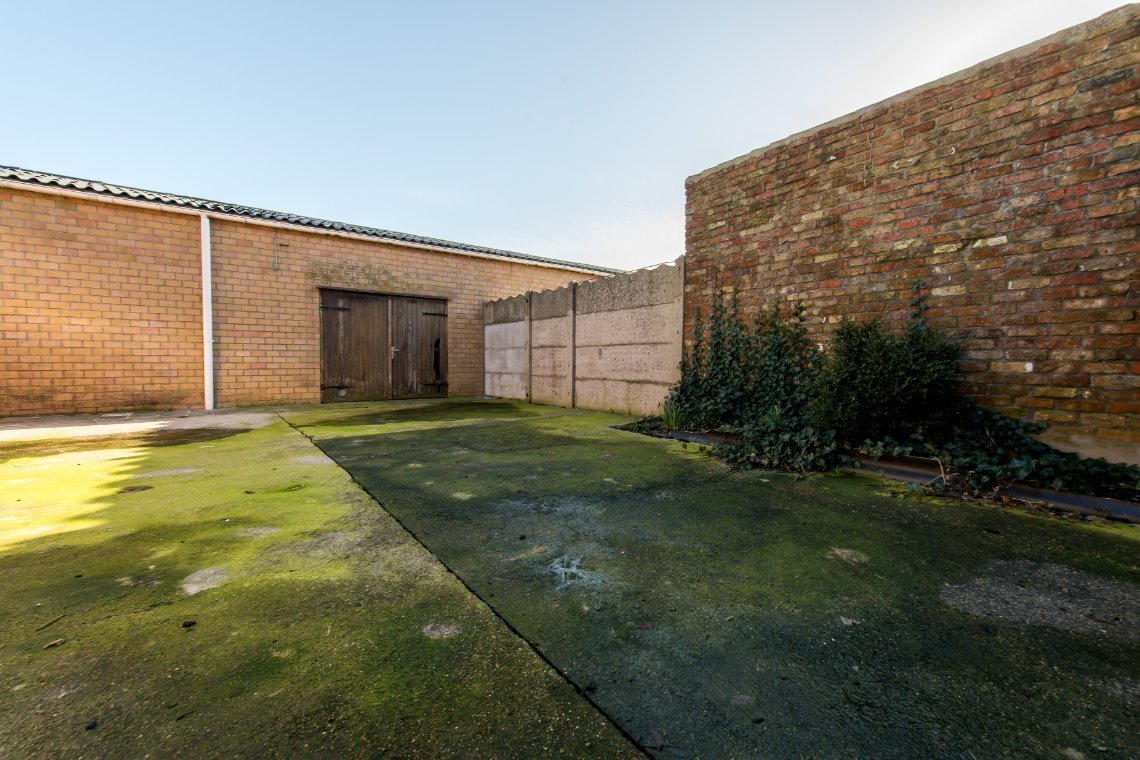 Gezellige rijwoning met grote garage - Centrum Nieuwkapelle 