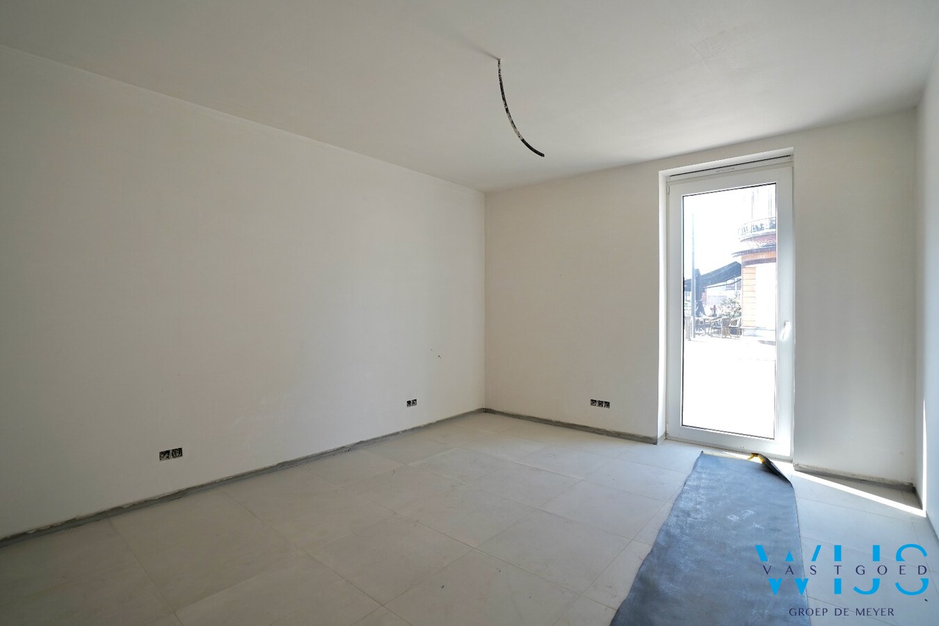Ruim gelijkvloers nieuwbouwappartement met tuin en 2 terrassen 