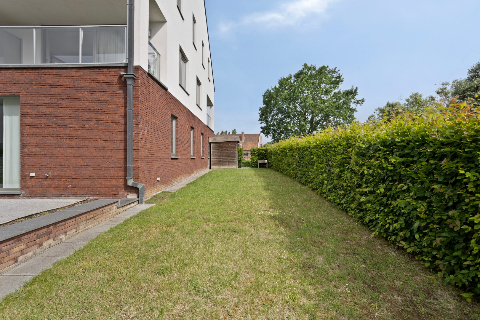 Instapklaar gelijkvloers appartement met groot terras, tuin en garagebox in Kumtich - EPC 104 KWH/m² 