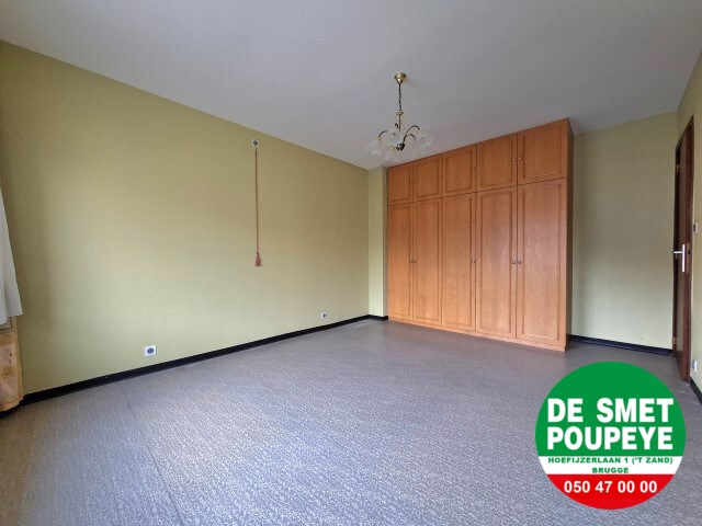 Ruime rijwoning met garage en tuin 