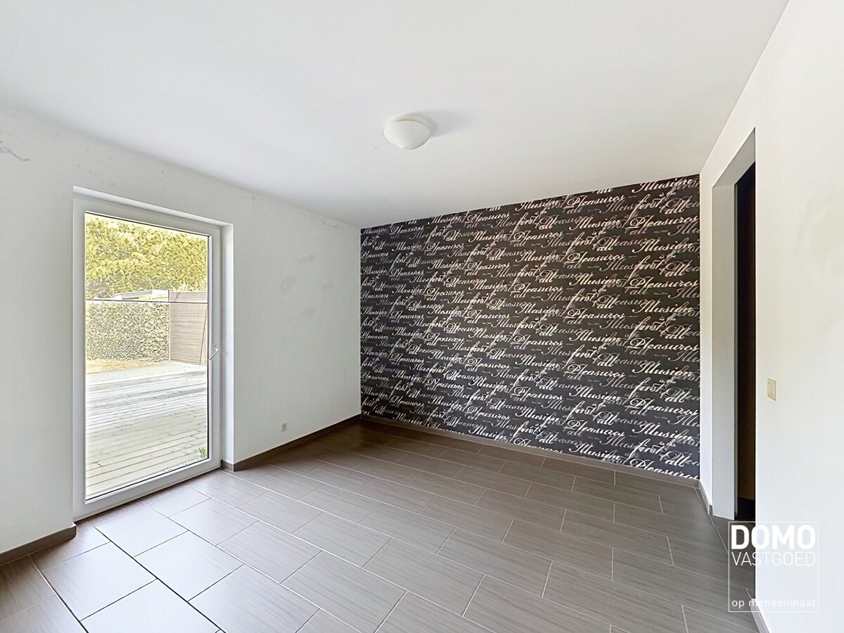 Gelijkvloers appartement met tuin en ondergrondse garage te Kermt - energielabel B -121m² bewoonbare oppervlakte 