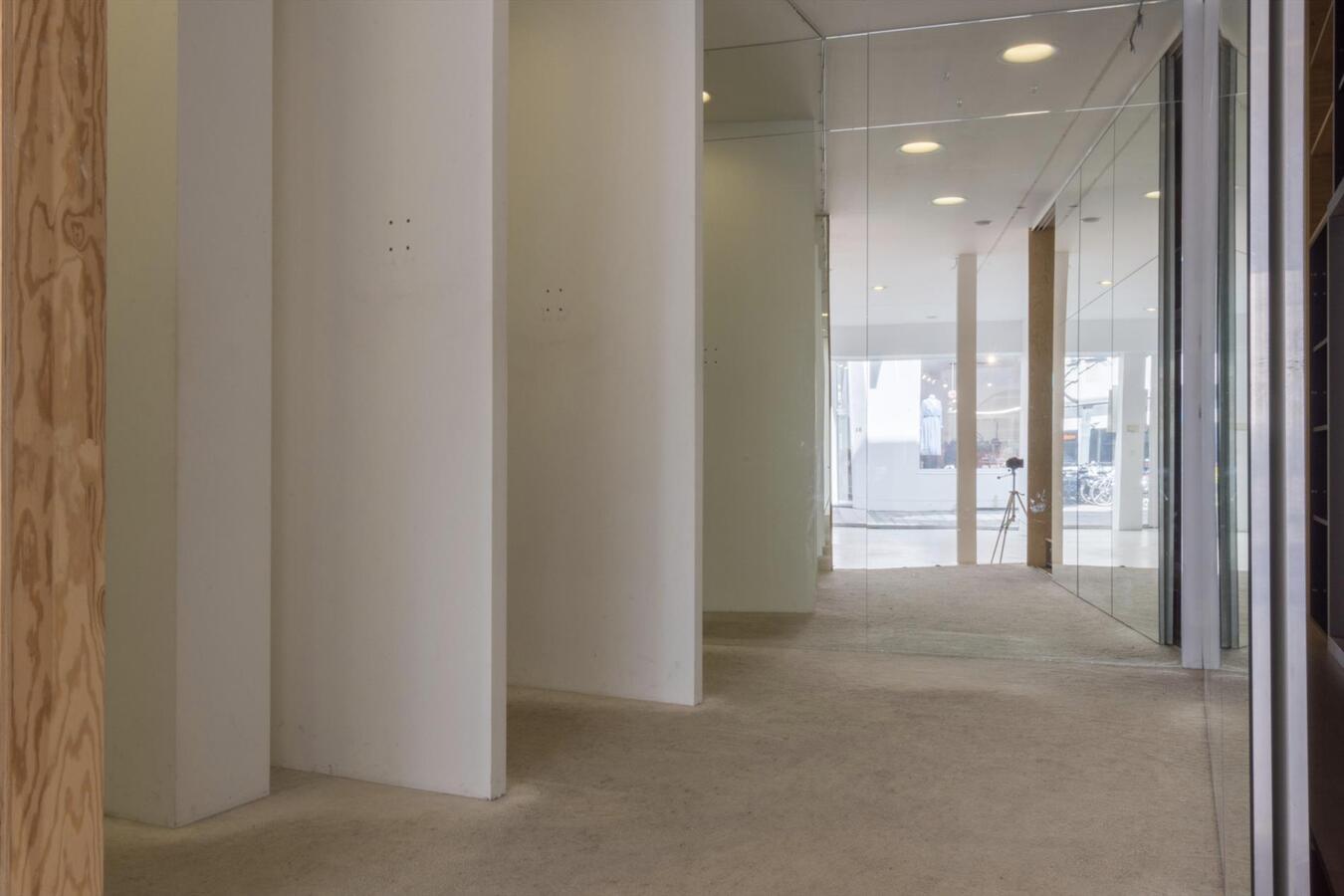 Lichtrijke winkelruimte in de kuip van Gent 