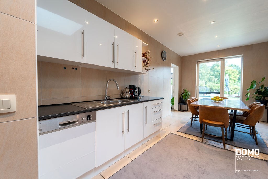 Gunstig gelegen handelshuis te Spalbeek (Hasselt) 