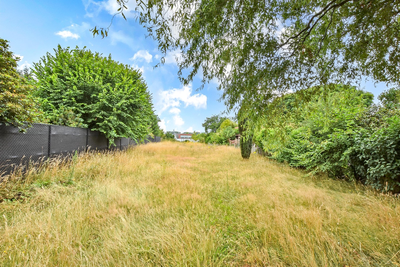 Halfopen bebouwing met mogelijkheid tot 7 slaapkamers, 2 badkamers en grote tuin in Aalter 