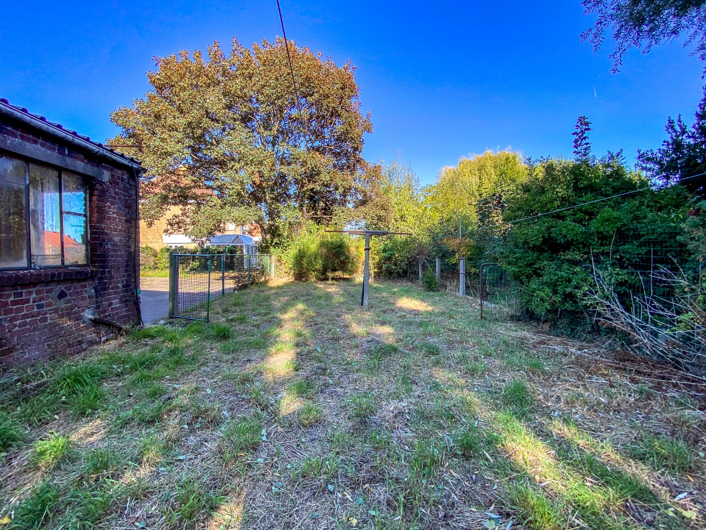 Woning met een enorm potentieel aan bruikbare oppervlakte op 1441m². 