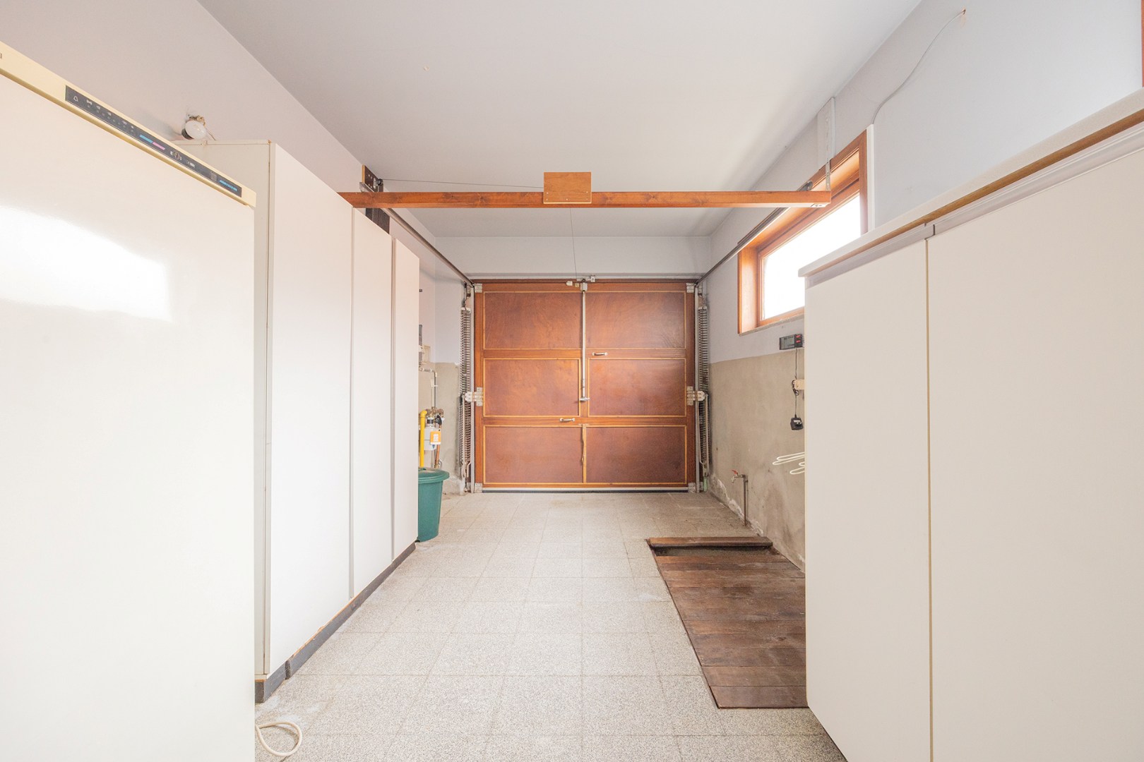 Open bebouwing met tuin en garage 