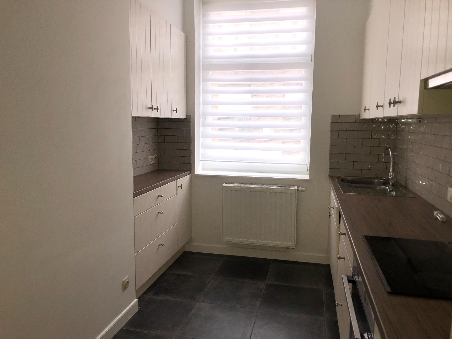 Instapklare woning met 2 slpks en stadstuin 