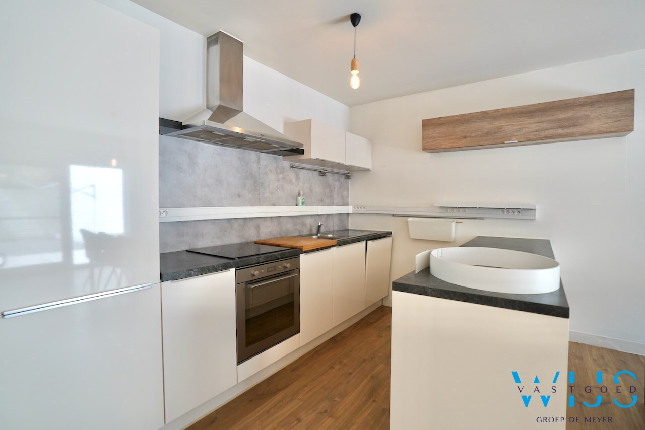 Prachtig ruim 1 slaapkamer appartement op het gelijkvloers met toffe tuin ! 